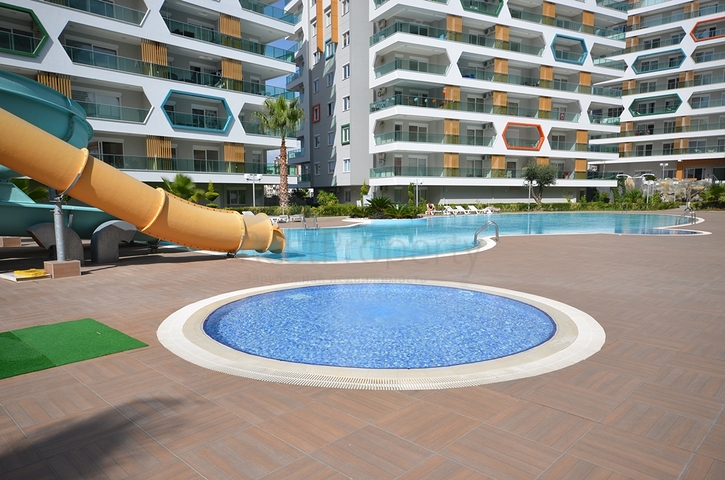 طابق مرتفع -شقة 1+1 ضمن مجمع يضم كافة الخدمات - في افسلار / الانيا 