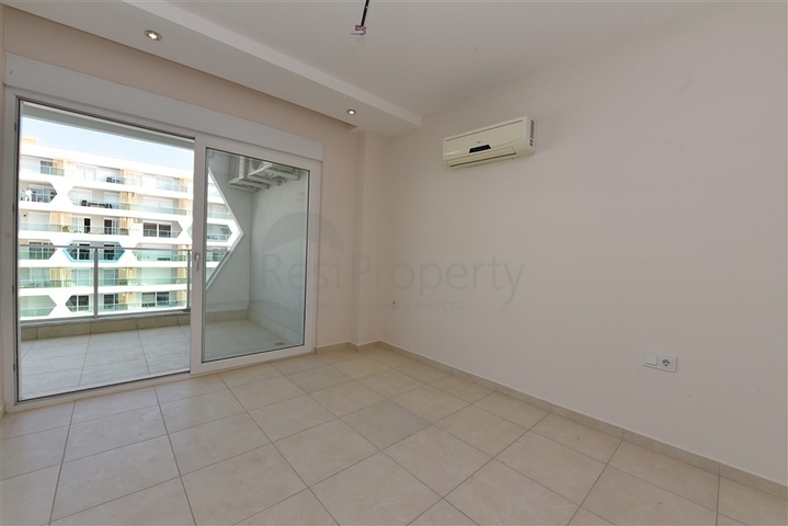 طابق مرتفع -شقة 1+1 ضمن مجمع يضم كافة الخدمات - في افسلار / الانيا 