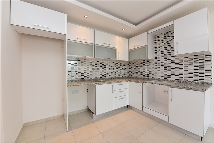 طابق مرتفع -شقة 1+1 ضمن مجمع يضم كافة الخدمات - في افسلار / الانيا 