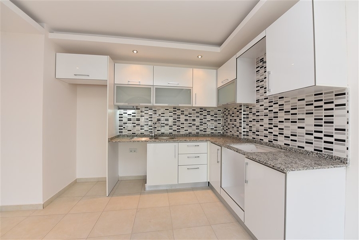 طابق مرتفع -شقة 1+1 ضمن مجمع يضم كافة الخدمات - في افسلار / الانيا 