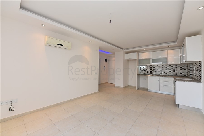 طابق مرتفع -شقة 1+1 ضمن مجمع يضم كافة الخدمات - في افسلار / الانيا 