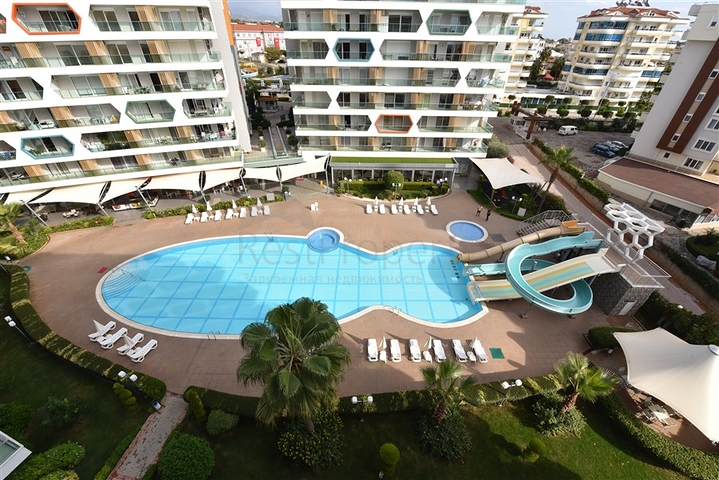 طابق مرتفع -شقة 1+1 ضمن مجمع يضم كافة الخدمات - في افسلار / الانيا 