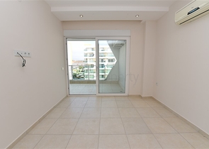 طابق مرتفع -شقة 1+1 ضمن مجمع يضم كافة الخدمات - في افسلار / الانيا 