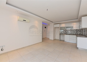 طابق مرتفع -شقة 1+1 ضمن مجمع يضم كافة الخدمات - في افسلار / الانيا 