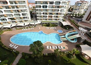 طابق مرتفع -شقة 1+1 ضمن مجمع يضم كافة الخدمات - في افسلار / الانيا 