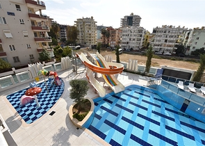 مجمع بخدمات 5 نجوم - شقة 2 غرفة وصالة - اطلالة مسبح- في مهموتلار/ الانيا 