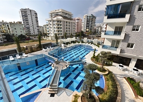 مجمع بخدمات 5 نجوم - شقة 2 غرفة وصالة - اطلالة مسبح- في مهموتلار/ الانيا 