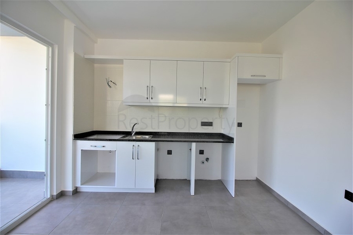 ضمن مجمع حديث يضم كافة الخدمات - دوبلكس 2 غرفة وصالة - في مهموتلار / الانيا 