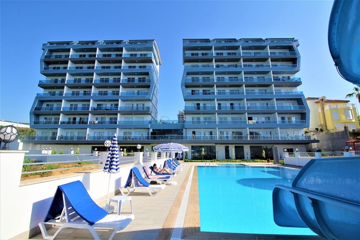 ضمن مجمع حديث يضم كافة الخدمات - دوبلكس 2 غرفة وصالة - في مهموتلار / الانيا 