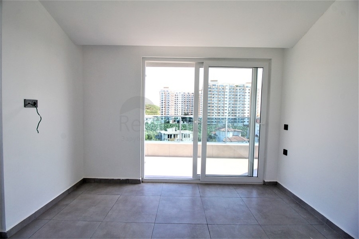 ضمن مجمع حديث يضم كافة الخدمات - دوبلكس 2 غرفة وصالة - في مهموتلار / الانيا 