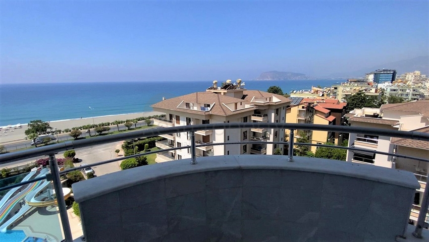 اطلالة بحرية ساحرة -طابق مرتفع - شقة غرفتين وصالة ضمن مجمع اول صف على البحر - في توسمور / الانيا