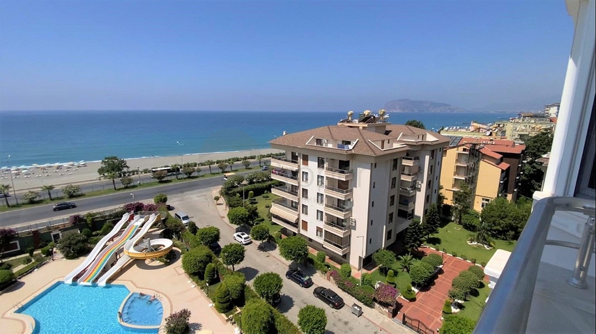 اطلالة بحرية ساحرة -طابق مرتفع - شقة غرفتين وصالة ضمن مجمع اول صف على البحر - في توسمور / الانيا