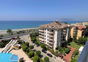 اطلالة بحرية ساحرة -طابق مرتفع - شقة غرفتين وصالة ضمن مجمع اول صف على البحر - في توسمور / الانيا