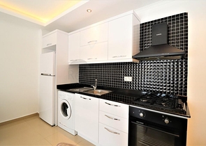 سعر مميز ضمن منطقة راقية - شقة 2 غرفة وصالة ضمن مجمع سكني في منطقة كاستل / الانيا 