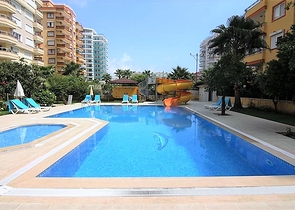 شقة عائلية انيقة - مطبخ منفصل - ضمن مجمع سكني في مهموتلار / الانيا 