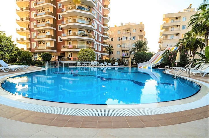 اطلالة بحر - شقة غرفتين وصالة مفروشة - ضمن مجمع في اول صف عالبحر - في مهموتلار / الانيا 