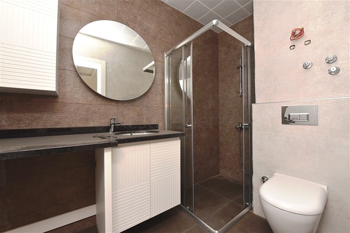 ضمن مجمع بخدمات 5 نجوم - شقة غرفة وصالة - قريبة من البحر والخدمات - في مهموتلار / الانيا 