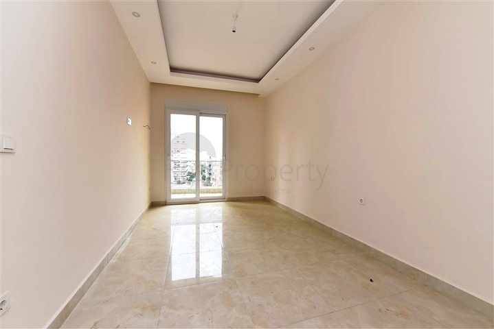 ضمن مجمع بخدمات 5 نجوم - شقة غرفة وصالة - قريبة من البحر والخدمات - في مهموتلار / الانيا 