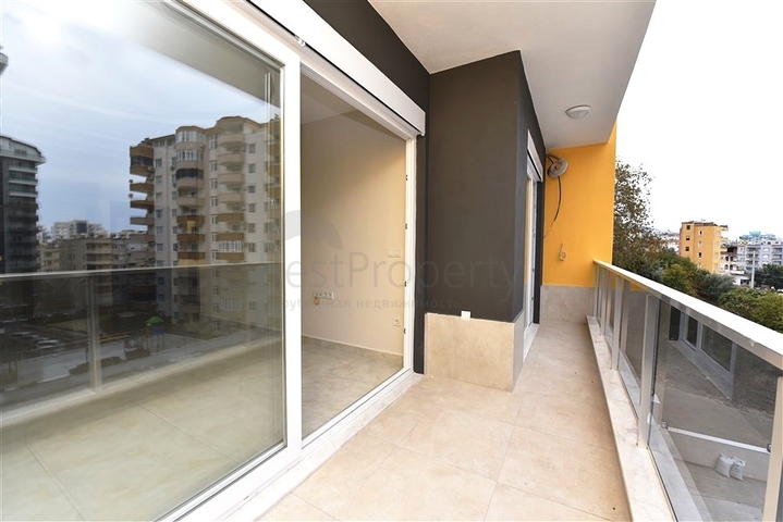 شقة غرفة وصالة -ضمن محمع سكني حديث -في مهموتلار / الانيا 