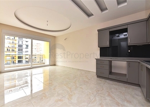 شقة غرفة وصالة -ضمن محمع سكني حديث -في مهموتلار / الانيا 