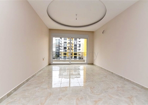 شقة غرفة وصالة -ضمن محمع سكني حديث -في مهموتلار / الانيا 