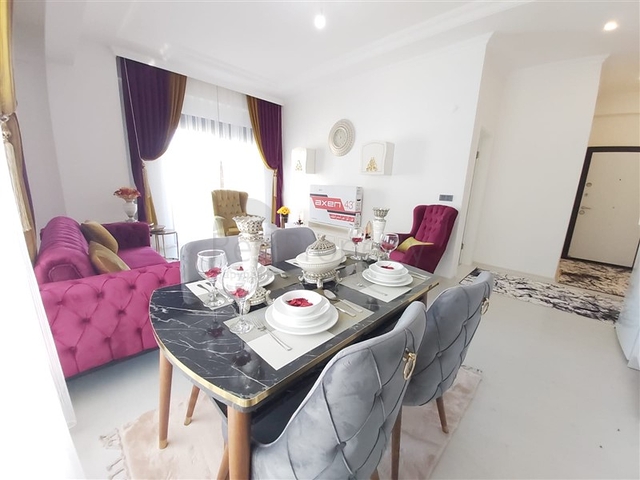 ضمن مجمع سكني جديد وقريب من البحر - شقة غرفة وصالة -مفروشة - في مهموتلار / الانيا 