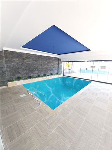 ضمن مجمع سكني جديد وقريب من البحر - شقة غرفة وصالة -مفروشة - في مهموتلار / الانيا 