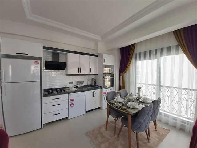 ضمن مجمع سكني جديد وقريب من البحر - شقة غرفة وصالة -مفروشة - في مهموتلار / الانيا 