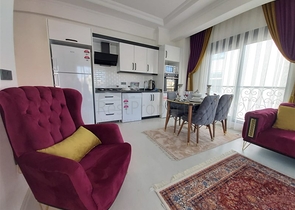 ضمن مجمع سكني جديد وقريب من البحر - شقة غرفة وصالة -مفروشة - في مهموتلار / الانيا 