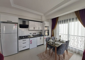 ضمن مجمع سكني جديد وقريب من البحر - شقة غرفة وصالة -مفروشة - في مهموتلار / الانيا 