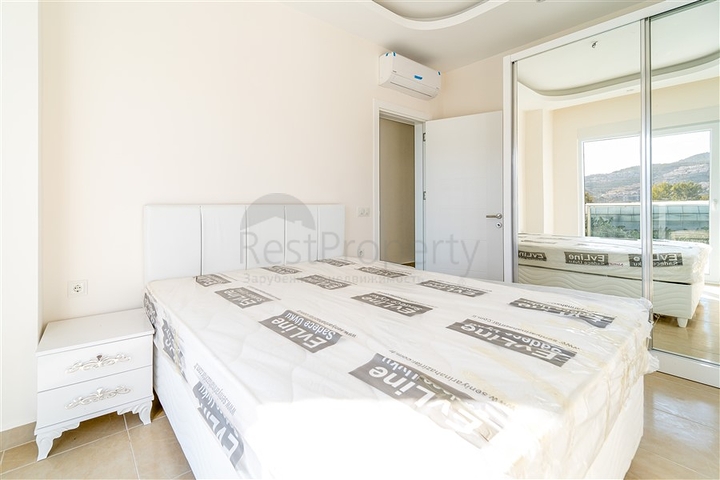 شقة غرفة وصالة - مجمع سكني حديث - قريب من الاسواق والبحر - في مهموتلار / الانيا 