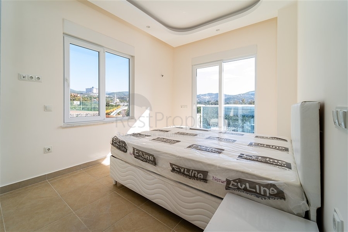 شقة غرفة وصالة - مجمع سكني حديث - قريب من الاسواق والبحر - في مهموتلار / الانيا 