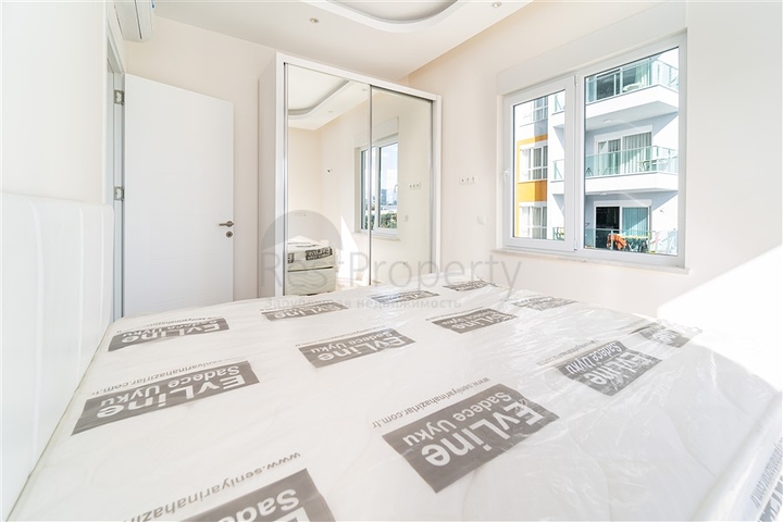 شقة غرفة وصالة - مجمع سكني حديث - قريب من الاسواق والبحر - في مهموتلار / الانيا 