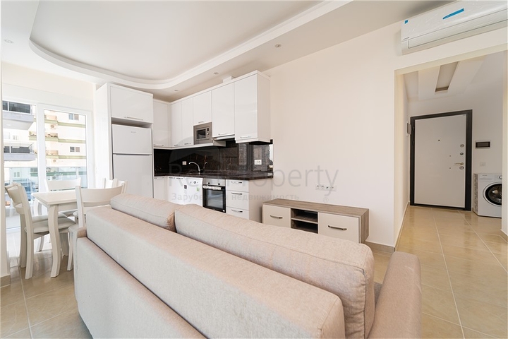 شقة غرفة وصالة - مجمع سكني حديث - قريب من الاسواق والبحر - في مهموتلار / الانيا 