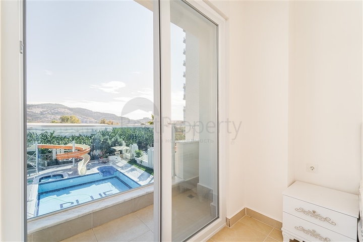 شقة غرفة وصالة - مجمع سكني حديث - قريب من الاسواق والبحر - في مهموتلار / الانيا 