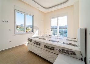 شقة غرفة وصالة - مجمع سكني حديث - قريب من الاسواق والبحر - في مهموتلار / الانيا 