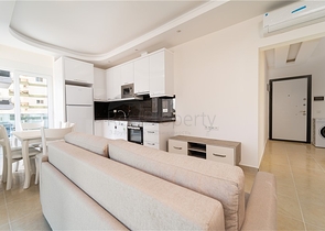 شقة غرفة وصالة - مجمع سكني حديث - قريب من الاسواق والبحر - في مهموتلار / الانيا 