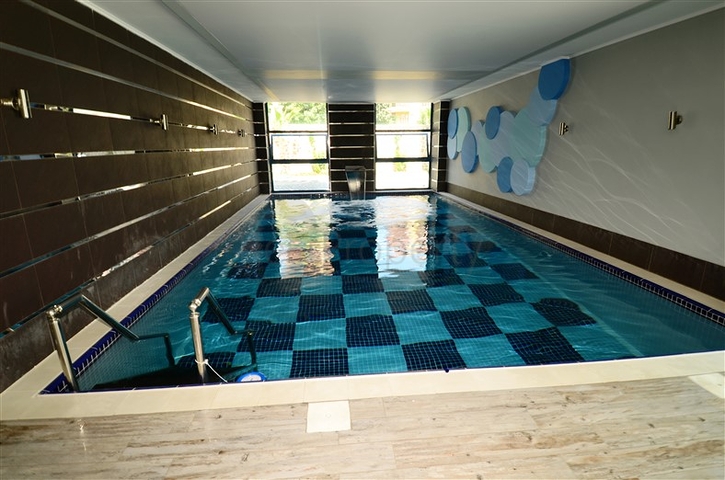 اطلالة بحر - شقة غرفة وصالة - ضمن مجمع 5 نجوم - في منطقة توسمور / الانيا 