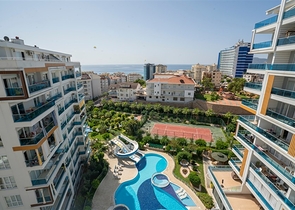 اطلالة بحر - شقة غرفة وصالة - ضمن مجمع 5 نجوم - في منطقة توسمور / الانيا 