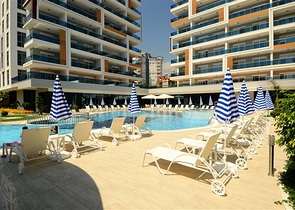 اطلالة بحر - شقة غرفة وصالة - ضمن مجمع 5 نجوم - في منطقة توسمور / الانيا 