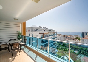 اطلالة بحر - شقة غرفة وصالة - ضمن مجمع 5 نجوم - في منطقة توسمور / الانيا 