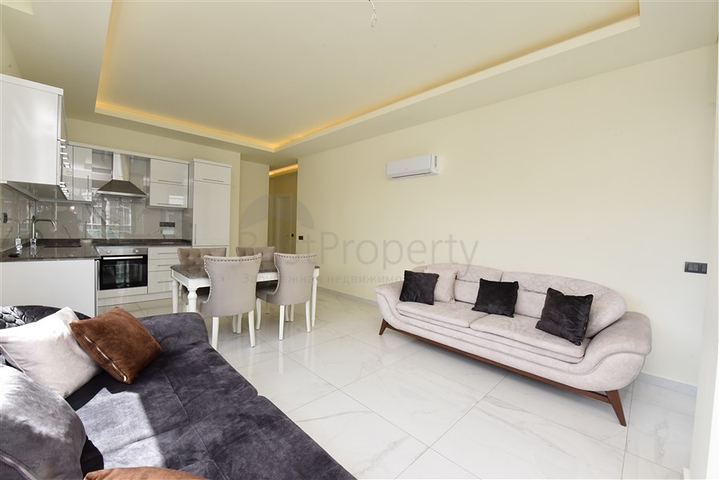 ضمن مجمع فاخر -في موقع استراتيجي - شقة 2 غرفة وصالة -  مركز الانيا 