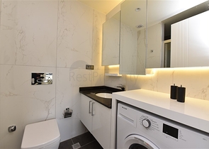 ضمن مجمع فاخر -في موقع استراتيجي - شقة 2 غرفة وصالة -  مركز الانيا 