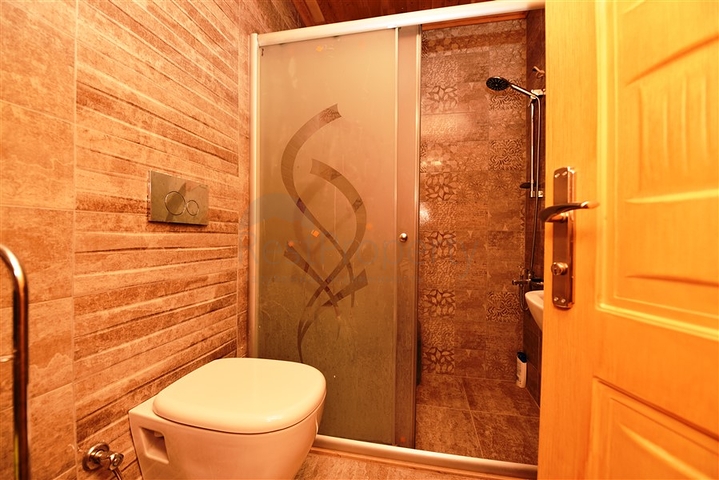 منزل خشبي مميز بين احضان الطبيعة - مع ارض زراعية مساحة 4 دونم ونصف -في ديمرتاش / الانيا 