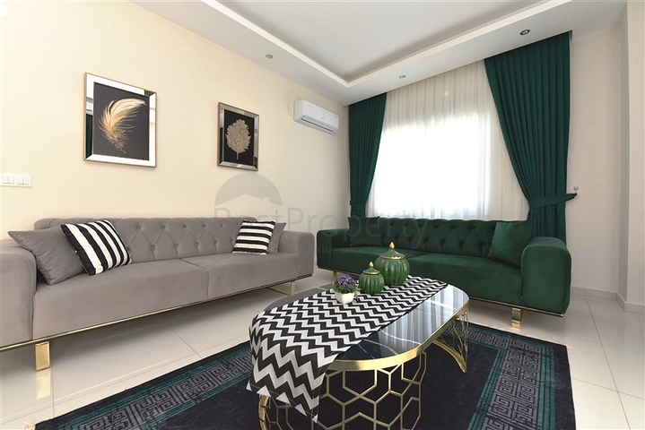 ضمن مجمع سكني حديث - قريب من البحر - شقة غرفتين وصالة في منطقة كارجي جاك / الانيا 