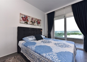 ضمن مجمع يضم كافة الخدمات - شقة مؤثثة من تصميم غرفة وصالة - في مهموتلار / الانيا 