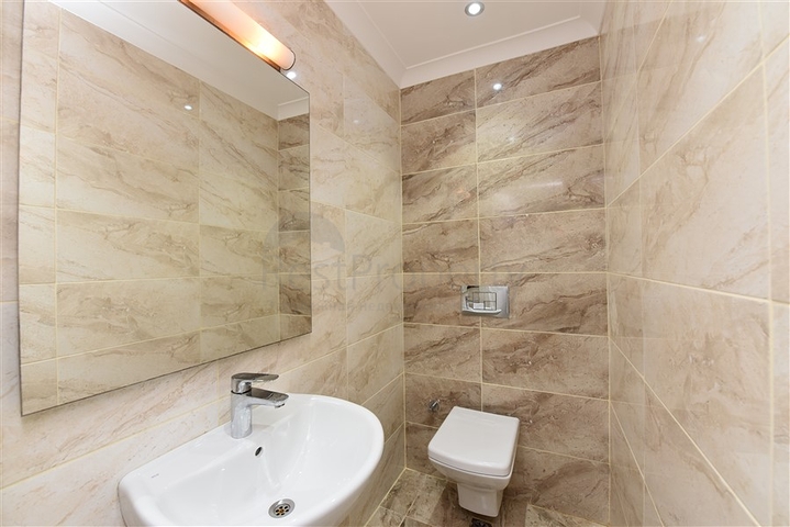 دوبلكس ارضية - تصميم غرفتين وصالة - ضمن مجمع يضم كافة الخدمات في كاستل / الانيا 