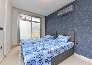 دوبلكس ارضية - تصميم غرفتين وصالة - ضمن مجمع يضم كافة الخدمات في كاستل / الانيا 