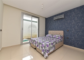 دوبلكس ارضية - تصميم غرفتين وصالة - ضمن مجمع يضم كافة الخدمات في كاستل / الانيا 