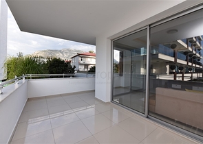 دوبلكس ارضية - تصميم غرفتين وصالة - ضمن مجمع يضم كافة الخدمات في كاستل / الانيا 